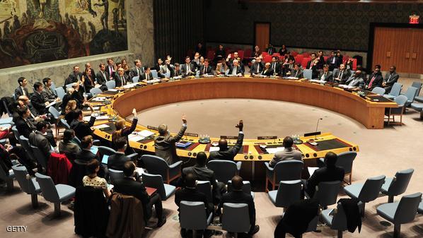 The United Nations Security Council votes to approve a resolution giving French and African troops the go-ahead to restore peace in the Central African Republic December 5, 2013 at UN headquarters in New York. AFP PHOTO/Stan HONDA (Photo credit should read STAN HONDA/AFP/Getty Images)