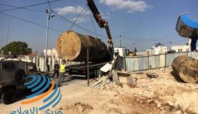 الاحتلال يستولي على صهريج وقود ومعدات حديقة عامة في حزما ومخماس