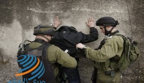 Israeli soldiers search a Palestinian youth during minor clashes at a demonstration against Israel's military operation in Gaza, in the West Bank town of Hebron,Tuesday, Dec. 30, 2008. Israeli aircraft kept up a relentless string of assaults on Hamas-ruled Gaza on Tuesday, smashing a government complex, security installations and the home of a top militant commander as thousands of Israeli ground troops, backed by tanks and artillery, massed along the border, waiting for a signal to attack. (AP Photo/Nasser Shiyoukhi)