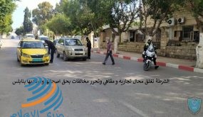 الشرطة والمؤسسة الأمنية تغلق محال تجارية وتحجز مركبات مخالفي قرار الاغلاق في نابلس