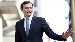 FILE - In this Aug. 29, 2018, file photo, White House Adviser Jared Kushner waves as he arrives at the Office of the United States Trade Representative in Washington. The Kushner family real estate firm has amassed over half a million dollars in unpaid fines for various New York City sanitation and building violations, much of that bill incurred while President Donald Trump's son-in-law and adviser Jared Kushner was running the company. (AP Photo/Jacquelyn Martin, File)